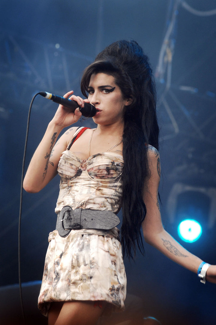 Galliano silk corset dress.
Early 2000s archive – same model worn on stage by Amy Winehouse (museum-documented)