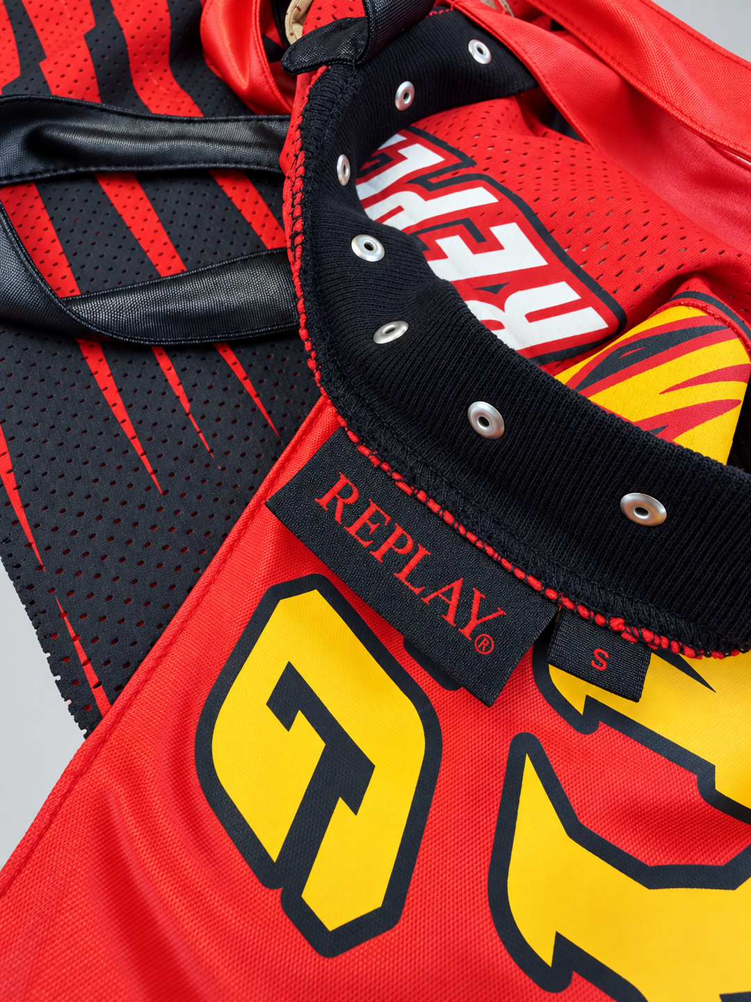 Replay racing asymmetric top