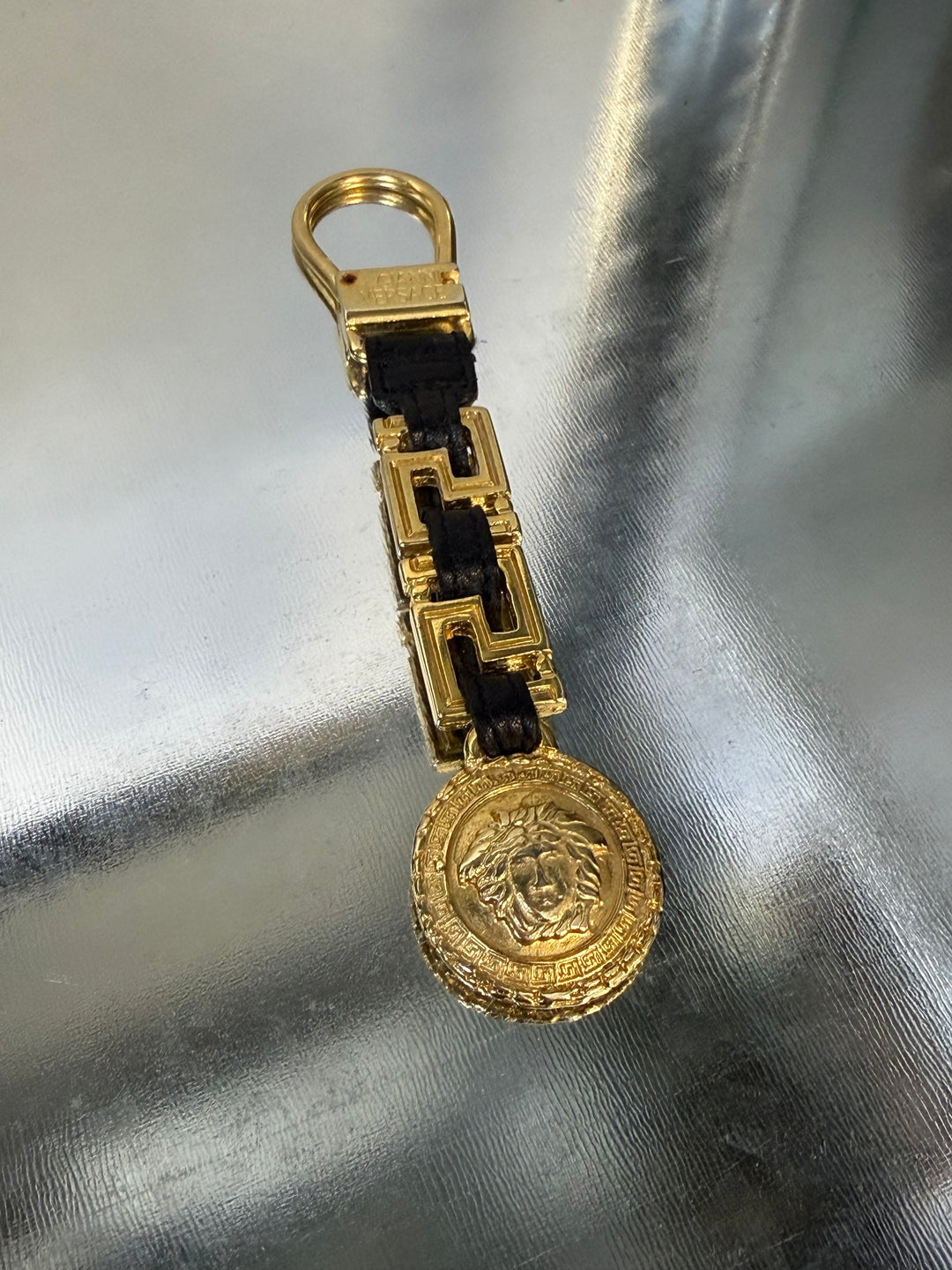 Gianni Versace gold Medusa keychain with leather chain