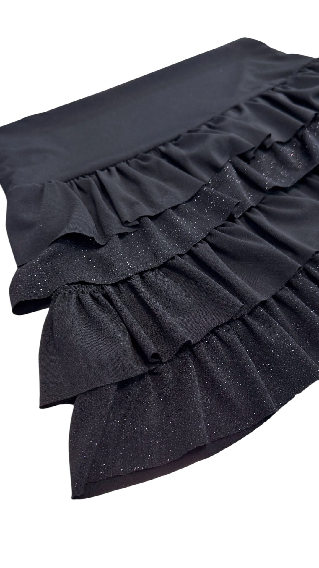 Vintage black ruffled mini skirt with subtle shimmer
