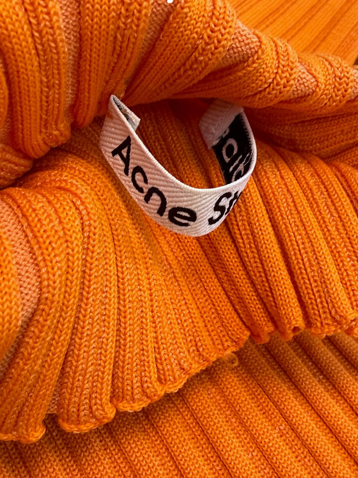 Acne Studios orange ribbed turtleneck sweater