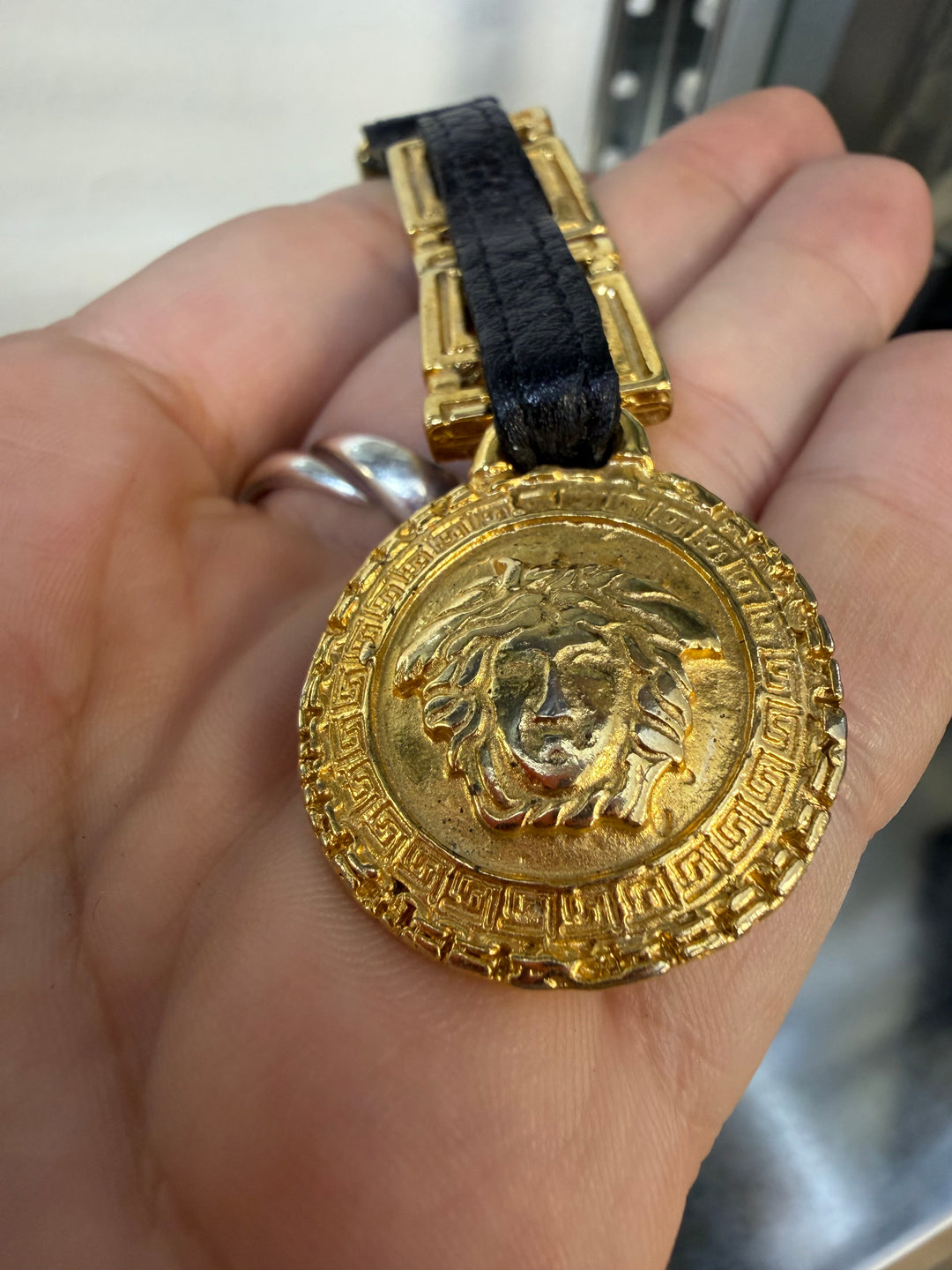 Gianni Versace gold Medusa keychain with leather chain