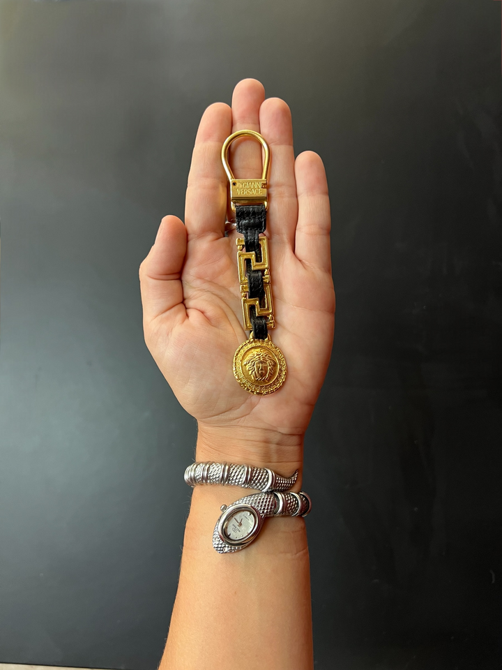 Gianni Versace gold Medusa keychain with leather chain