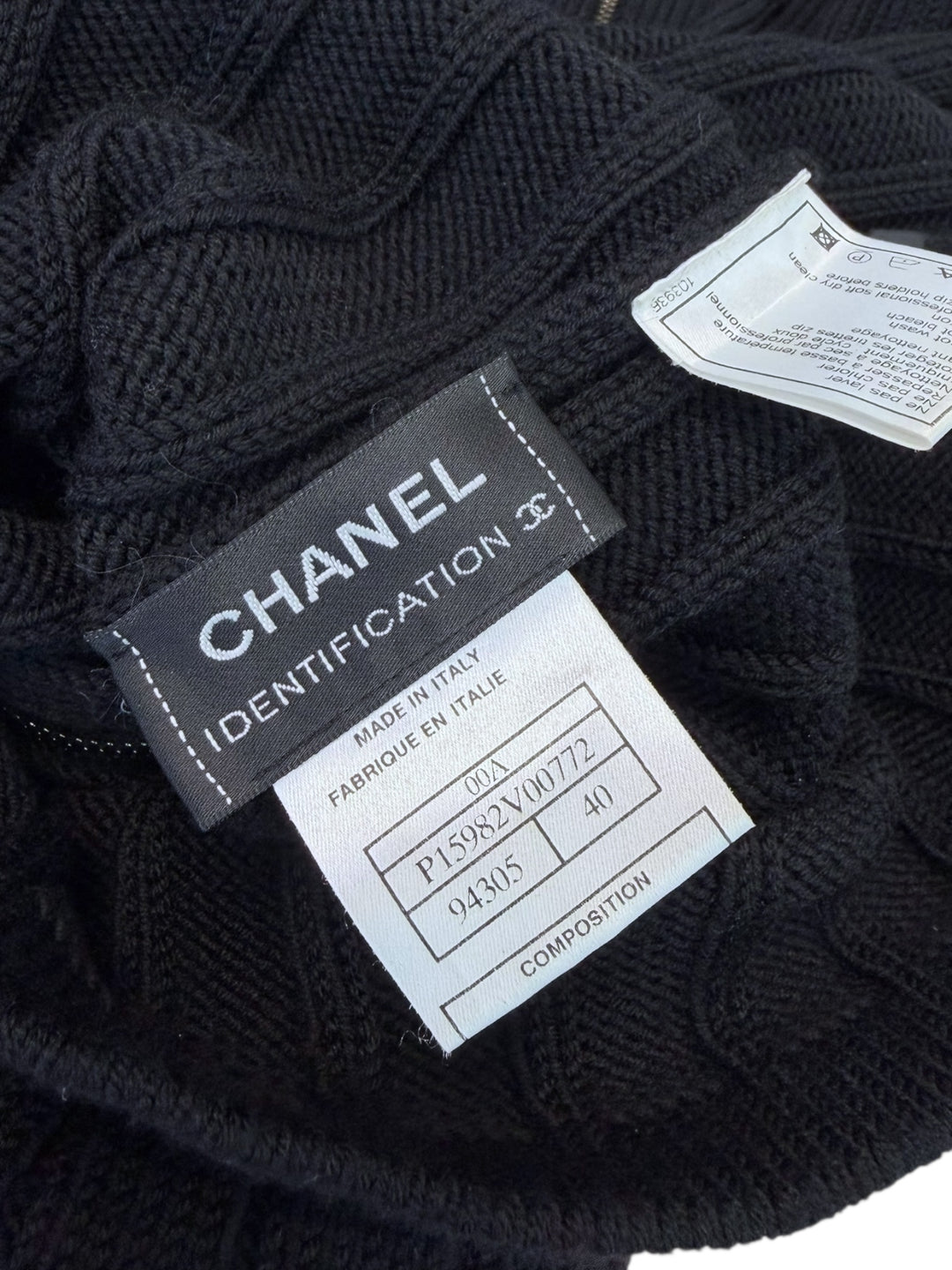 CHANEL Identification ribbed wool zip off-shoulder top