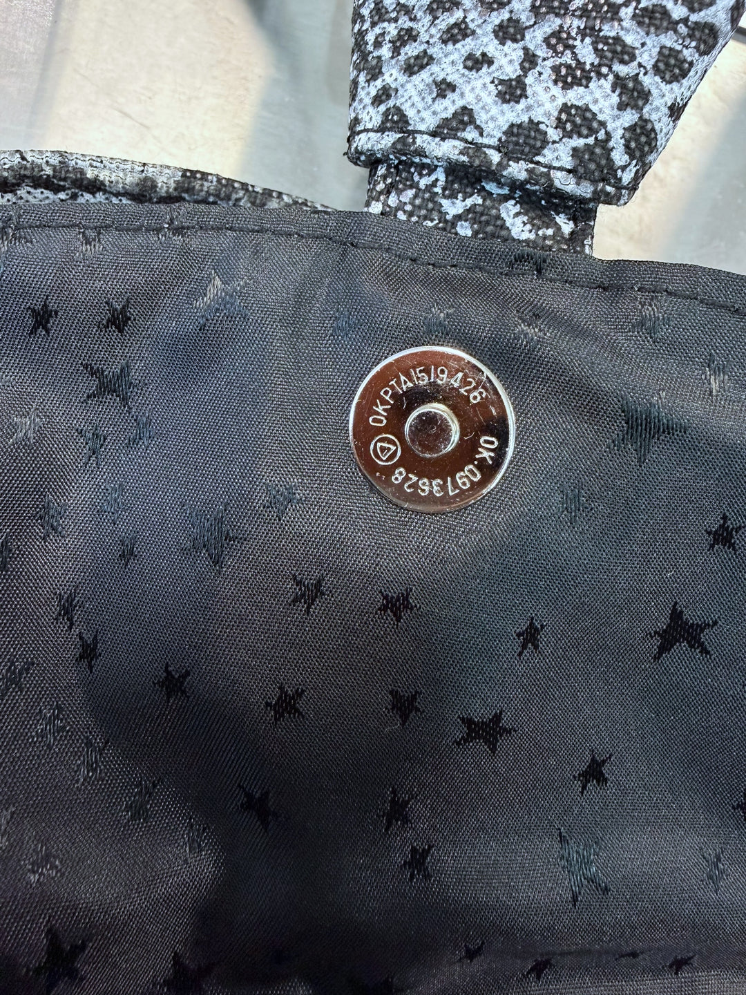 Mugler snake-print shoulder bag with star-stud details